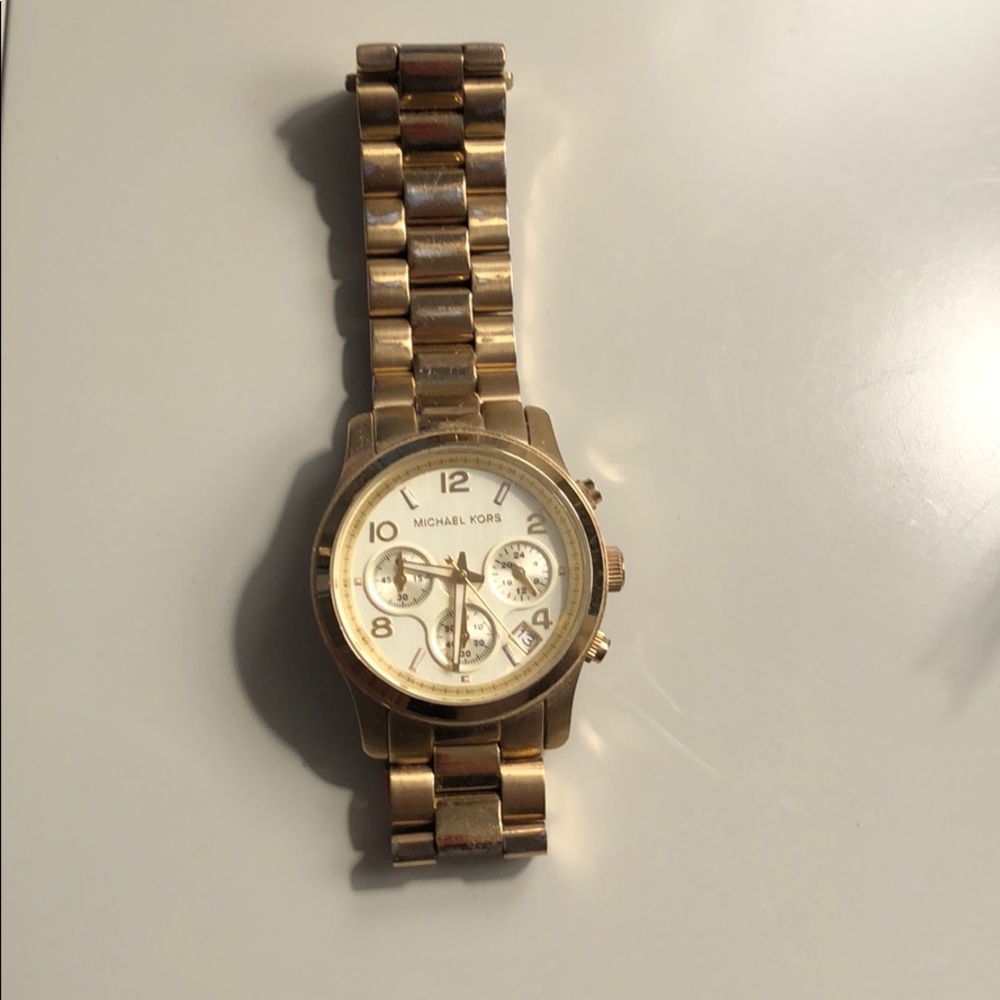 Michael Kors women’s gold watch